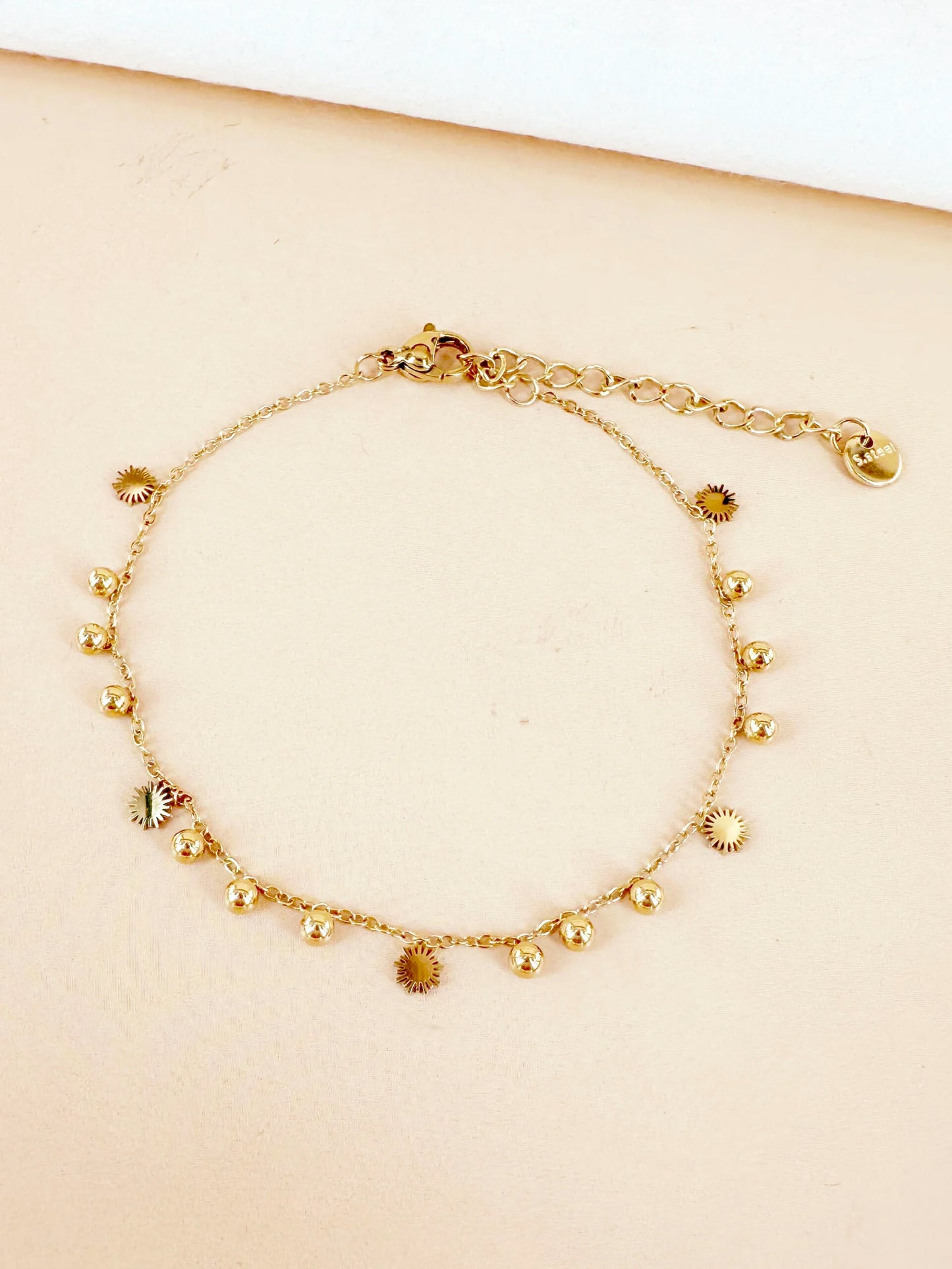 Bracelet Claudine chaîne perles et soleil